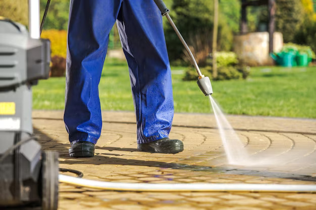 worker-pressure-washer_1426-19357
